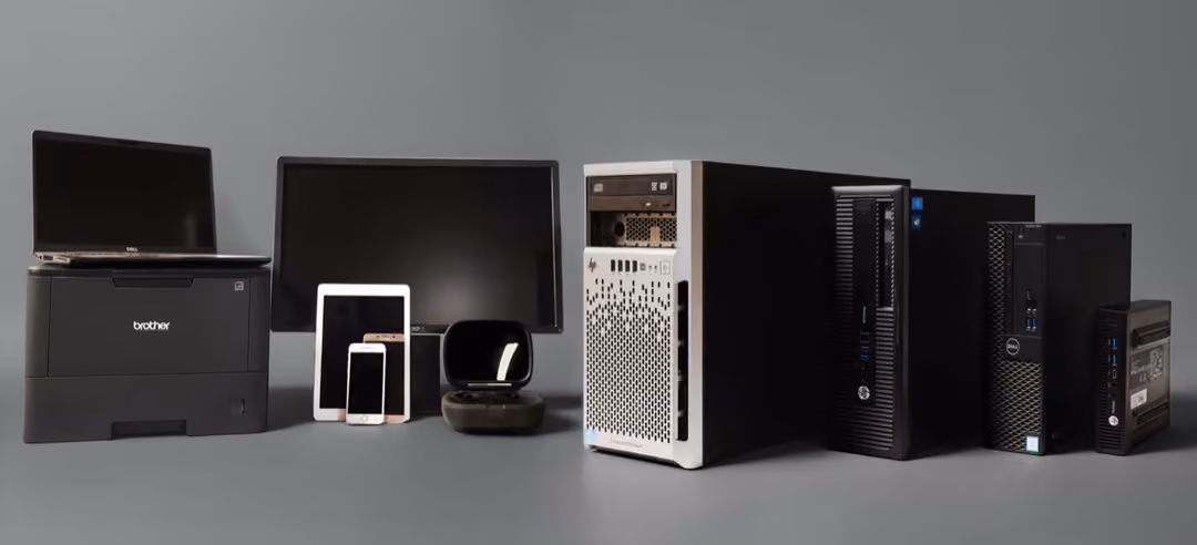 Assorted office electronics displayed for recycling