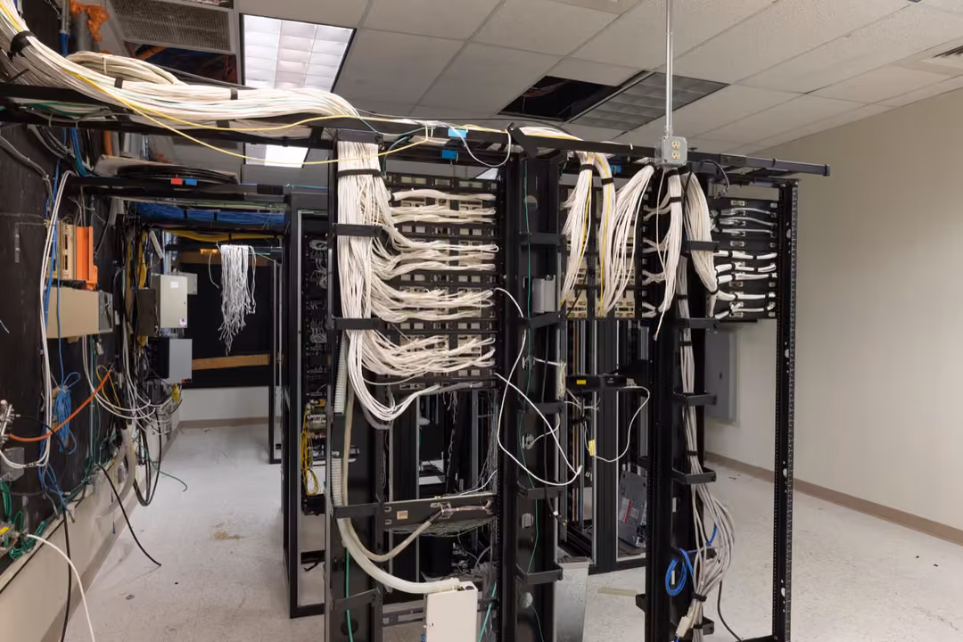 Data center server cabling room before decommissioning