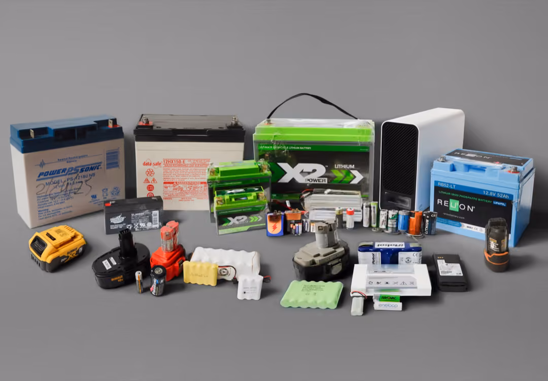 Various types and sizes of batteries collected for recycling