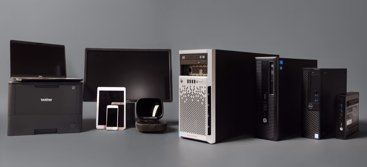 Assorted office electronics displayed for recycling