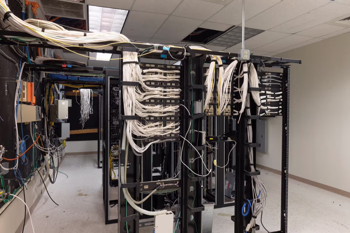 Data center server cabling room before decommissioning