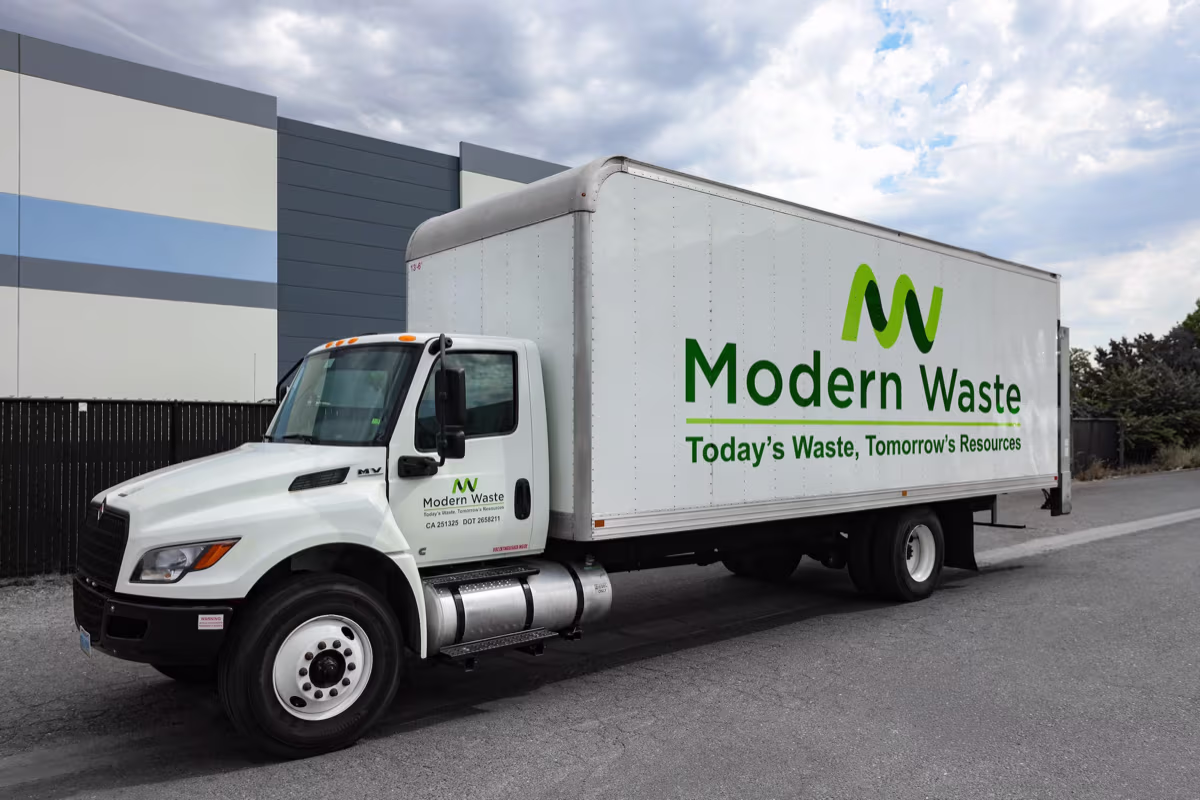 Modern Waste Solutions on-site recycling truck — side view