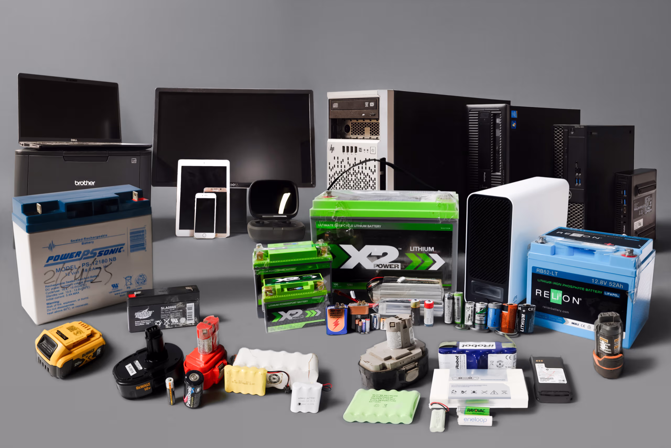 Assorted electronic devices and batteries collected for recycling